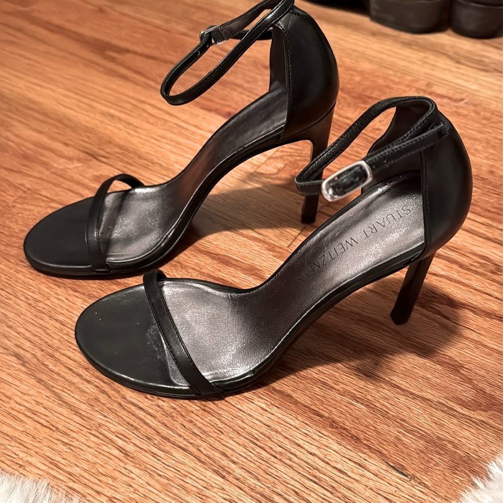 Stuart Weitzman leather ankle strap high heels.
Worn once.